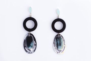Colorful bright earrings isolated on white background