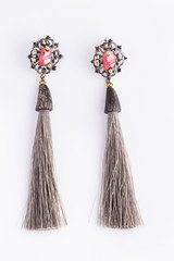 Colorful bright earrings isolated on white background