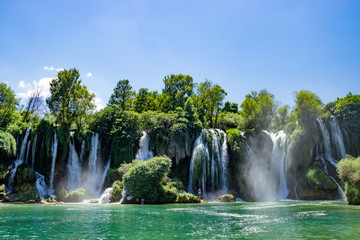 Fototapeta na wymiar Kravice Waterfall and Trebizat River in Bosnia