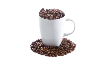 White cup and coffee beans