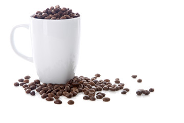 White cup and coffee beans