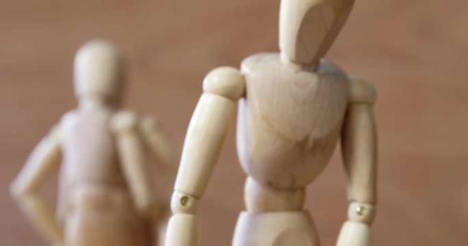 Figurine with bunch of roses jealous with other couple