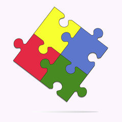 Jigsaw icon. Four different color pieces of puzzle joined together