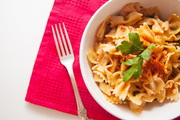 farfalle pasta with parmesan and tomato sauce