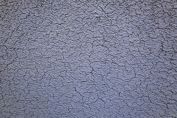 Cracked textured withered the surface of the plaster