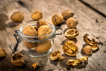 Wallnuts on vintage wooden table