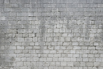 Old grey stone wall background texture