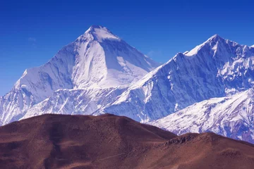 Crédence en verre imprimé Dhaulagiri vue sur le sommet de la montagne Dhaulagiri depuis la vallée et la ville de Muktinath, lieu saint pour les bouddhistes et les hindouistes dans l& 39 Himalaya, au Népal, circuit de l& 39 Annapurna   Région de l& 39 Himalaya.