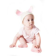 Baby girl in a rabbit hat