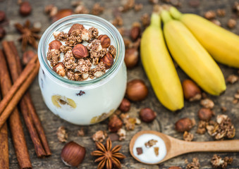 Serving of Yogurt with  Muesli, Banana and Nuts