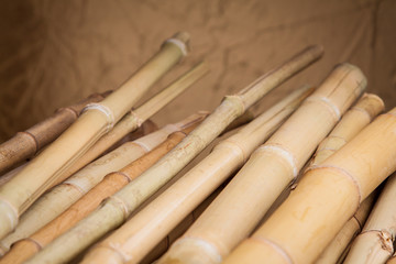 detail of bamboo stalks on a wooden table