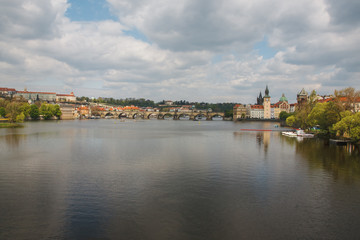 Fototapeta na wymiar Old Town reflected in the River Vltava shot from Strelecky Ostrov Island Prague
