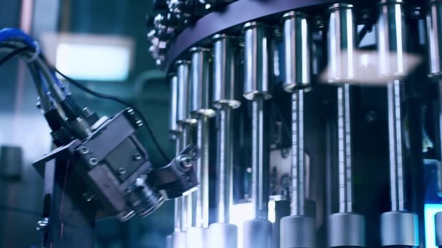 Pharmaceutical manufacturing machine. Pharmaceutical quality control technology. Automated industrial equipment at pharmaceutical factory. Pharmacy industry equipment. Modern pharmaceutical machine