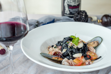 Black fettuccine with seafood