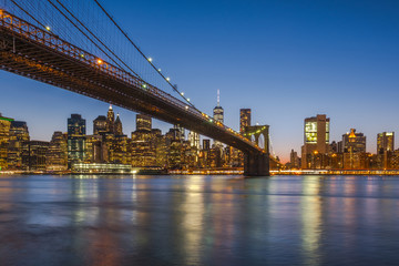 Brooklyn Bridge and Downtown Manhattan view at sunset