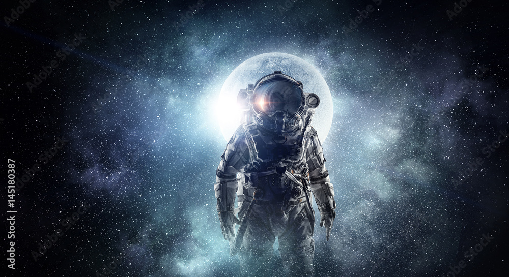Canvas Prints astronaut in outer space. mixed media . mixed media