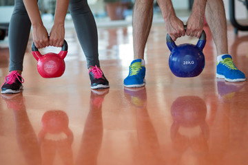 Fit people working out in fitness class at the gym