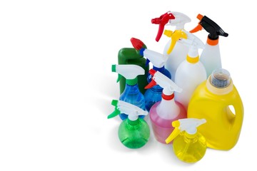 High angle view cleaning liquid in colorful spray bottles