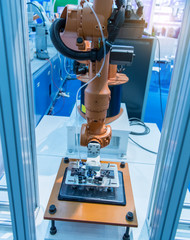 robotic arm machine tool at industrial manufacture plant,Smart factory industry 4.0 concept.