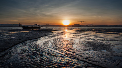 Morning sunrise over the water at sea.