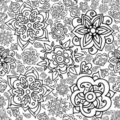 Floral seamless pattern with doodle flowers and leaves.Vector hand drawn pattern. Seamless pattern can be used for wallpapers, pattern fills, web page backgrounds, coloring book page. 