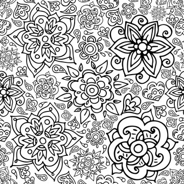 Floral seamless pattern with doodle flowers and leaves.Vector hand drawn pattern. Seamless pattern can be used for wallpapers, pattern fills, web page backgrounds, coloring book page. 