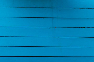 Texture of blue painted wood with horizontal lines