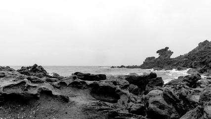 Obraz premium Dragon Head Rock dark or Yongduam of Jeju Island South Korea 