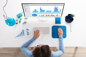 Businesswoman Analyzing Graph