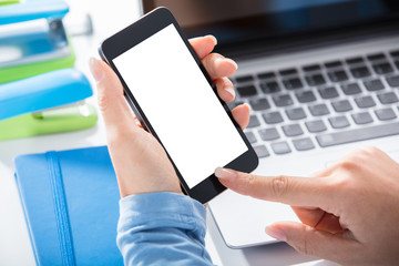 Woman Holding Blank Smart Phone In Hand