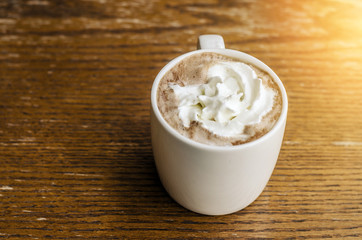 Coffee cup on table in coffee shop - vintage style effect picture
