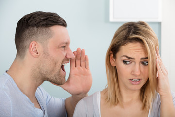 Man Screaming In His Wife's Ear