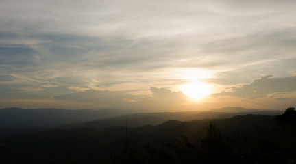 Landscape mountain in sunset with cloud and golden light