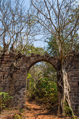 Arch at ancient fortress wall. Redi fort (Yashwantgad Fort). India, Maharashtra