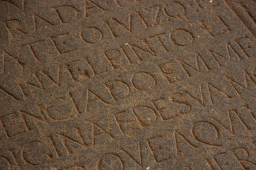 GOA, INDIA - MARCH 5: Stone plate with inscription in Church of St. Francis of Assisi on March 5, 2017, Old Goa, India