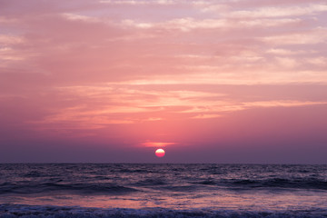 Fototapeta premium Amazing sunset at Arambol beach, North Goa, India