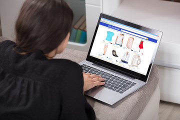 Woman Shopping Online Using Laptop