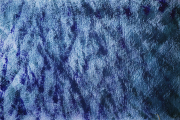 Blue paint on rough paper stains and stripes