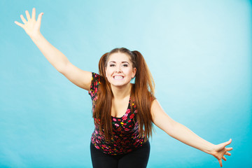 Happy teenager girl with ponytails