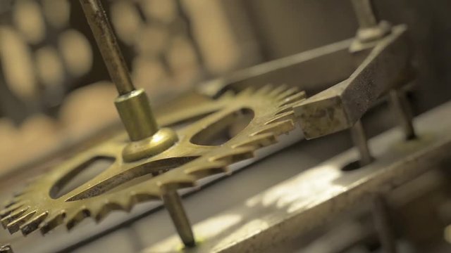 Cogwheels inside an old pendulum clock. Seamless looping