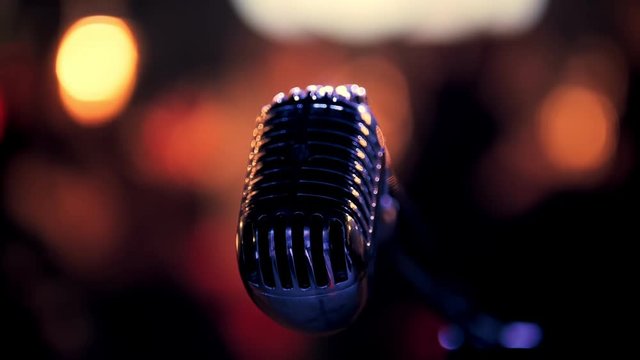 Vocal microphone at concert scene