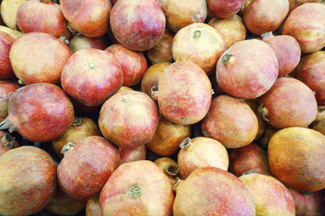 Pomegranate in the store close up for background