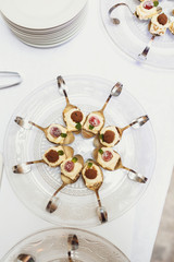 Cream and chocolate dessert on glass plate