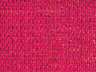 Texture of old textile vintage background with a pattern of red color closeup