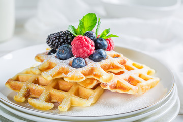 Closeup of homemade berries with waffles for breakfast