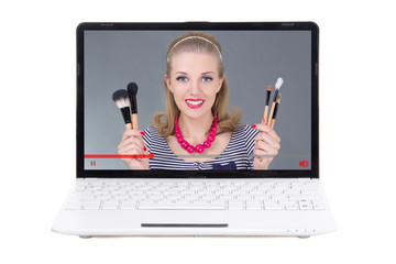 beauty blogger talking about make up brushes on laptop screen isolated on white