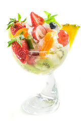 Desert made of fresh and sweet fruit on white background