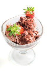 Tasty chocolate ice cream with strawberry on white background