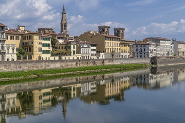 Fototapeta na wymiar Beautiful view of the historic center of Florence, Italy, from the Lungarno Serristori, with reflection in the Arno river