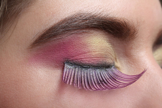 Eye makeup with extended eyelashes close-up